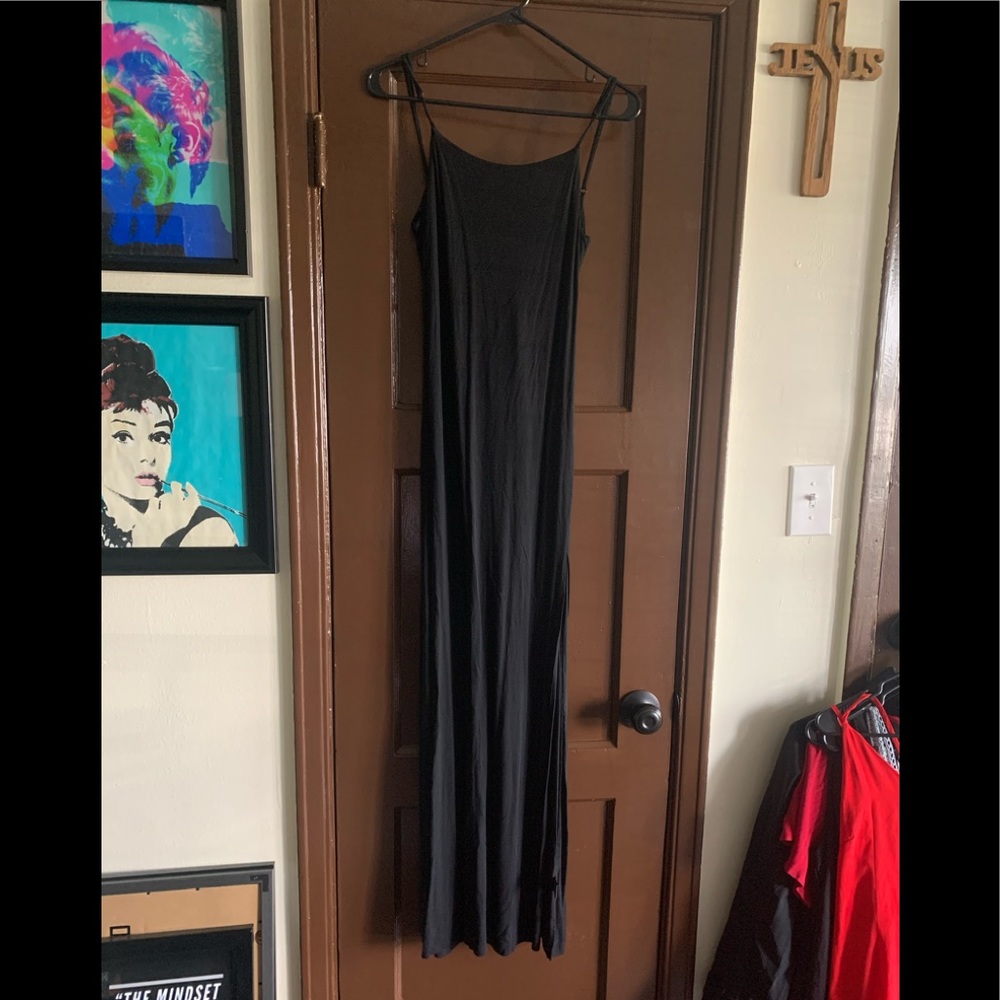 Black fitted maxi dress with slit up front